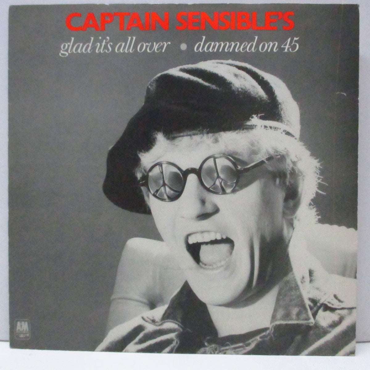 CAPTAIN SENSIBLE (キャプテン・センシブル) - Glad It's All Over (UK オリジナル 7"/光沢ソフト紙ジャケ) B面はアルバム未収録のダムド・メドレー !