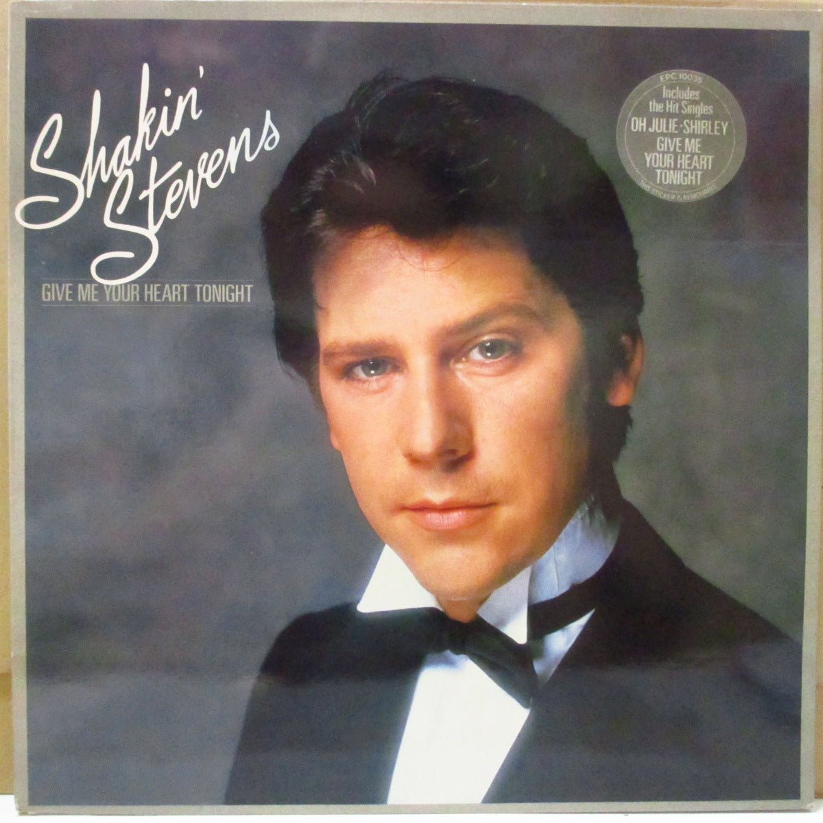 SHAKIN' STEVENS (シェイキン・スティーヴンス) - Give Me Your Heart Tonight (UK オリジナル LP/レアステッカー付きジャケ)