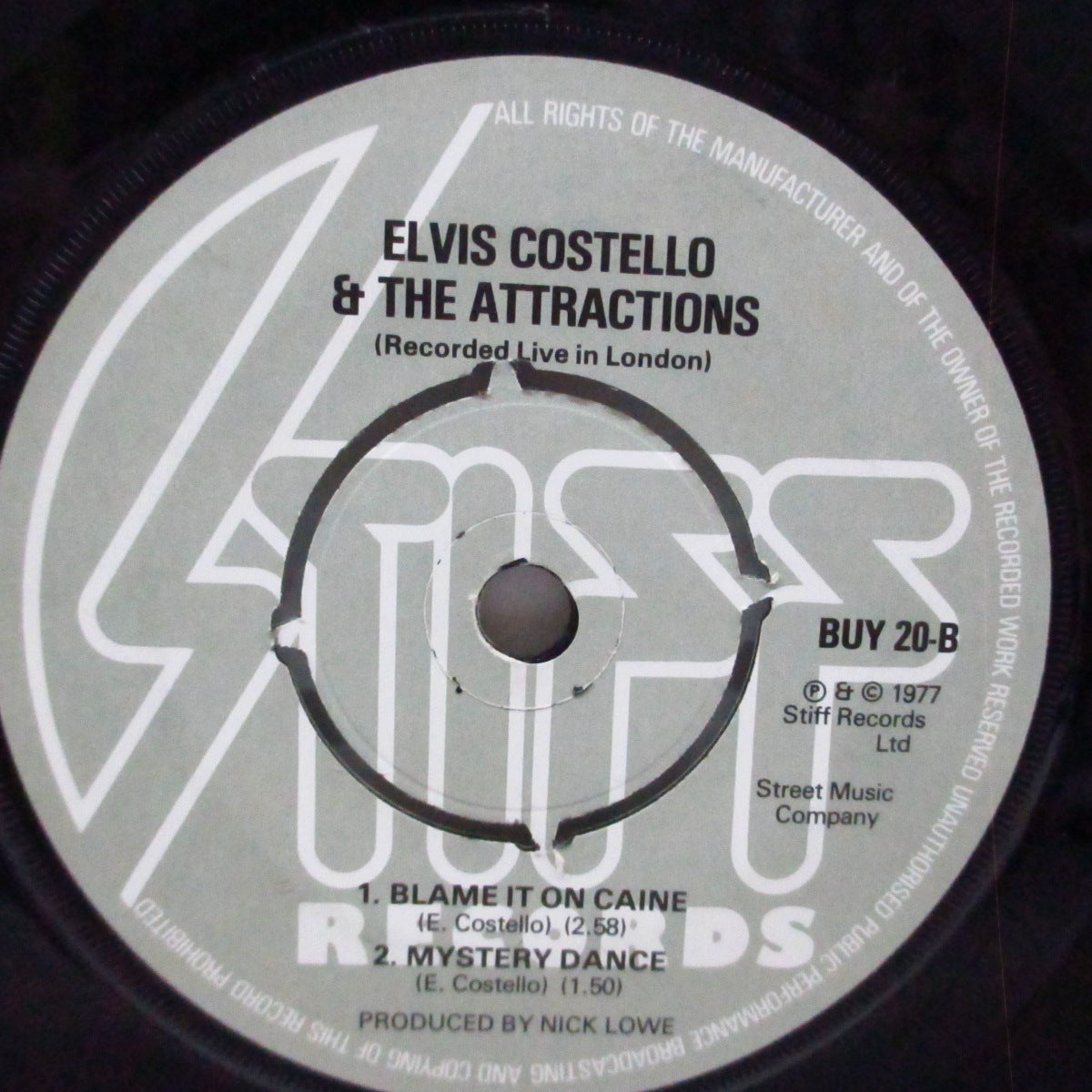 ELVIS COSTELLO  (エルヴィス・コステロ)  - Watching The Detectives (UK オリジナル「ラウンドセンター」7"+カンパニースリーブ）Stiffからのラストシングル！